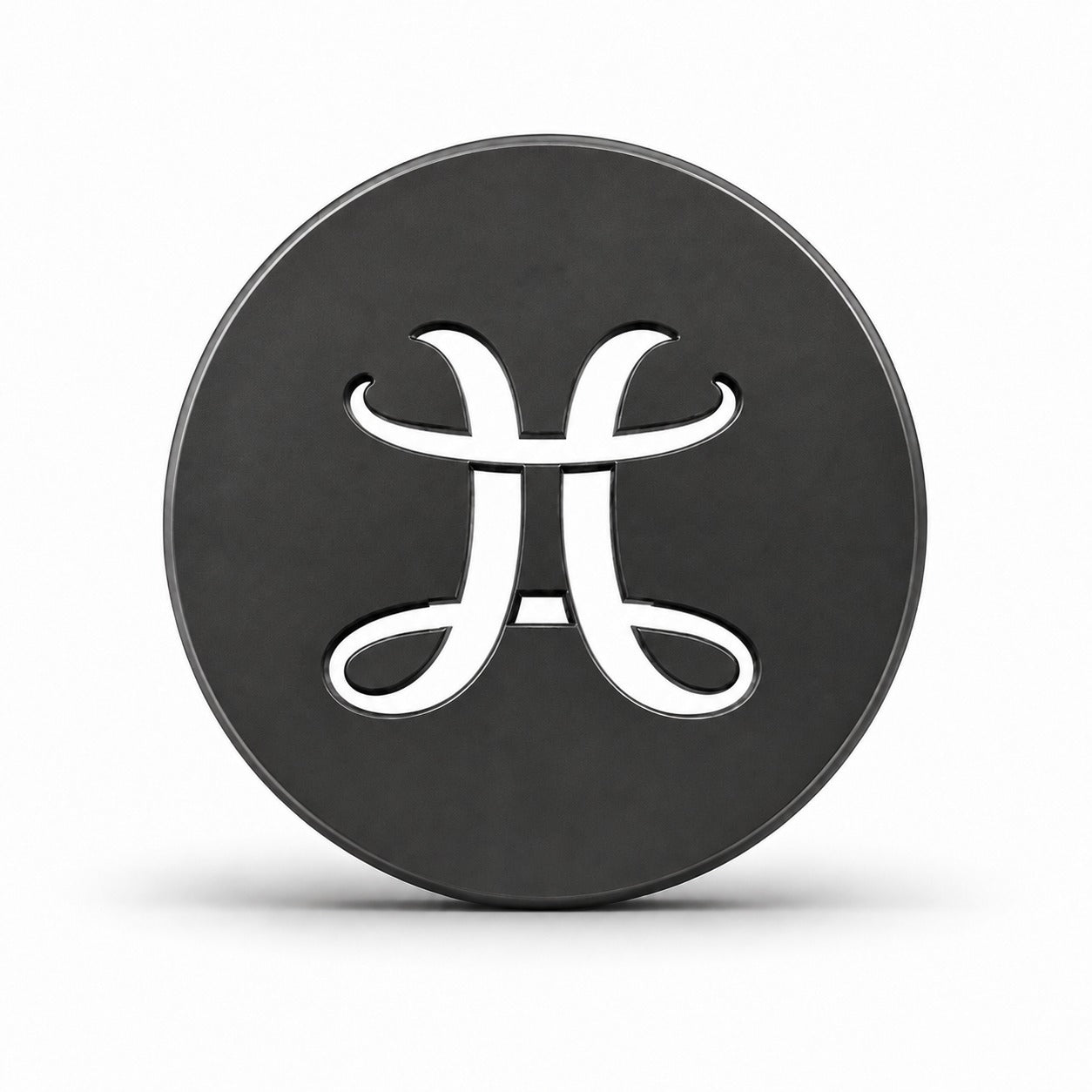Black Laxariah emblem coin on a clean white background
